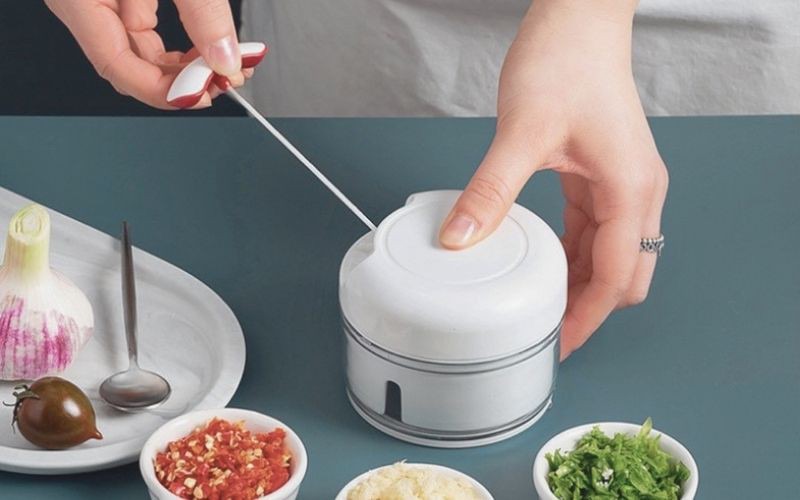 Máy xay hành tỏi rút dây giá rẻ không thể xay nhuyễn tỏi